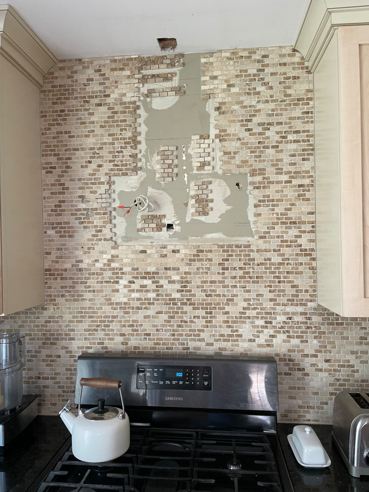 Took down old range hood, no tile under it, now what?