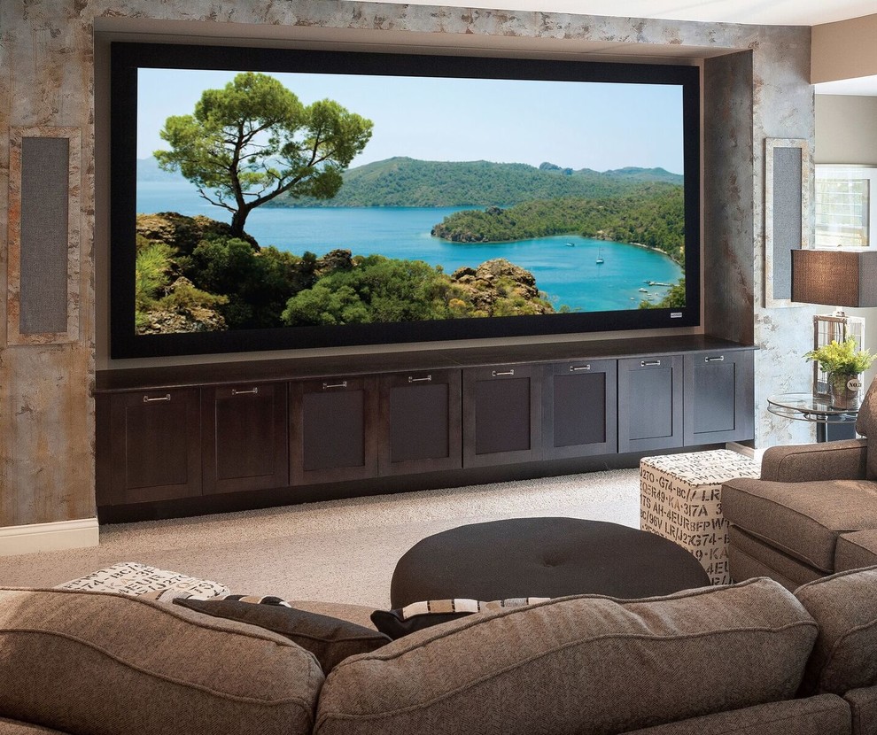 Photo of a large transitional open concept home theatre in Orange County with brown walls, carpet, a wall-mounted tv and brown floor.