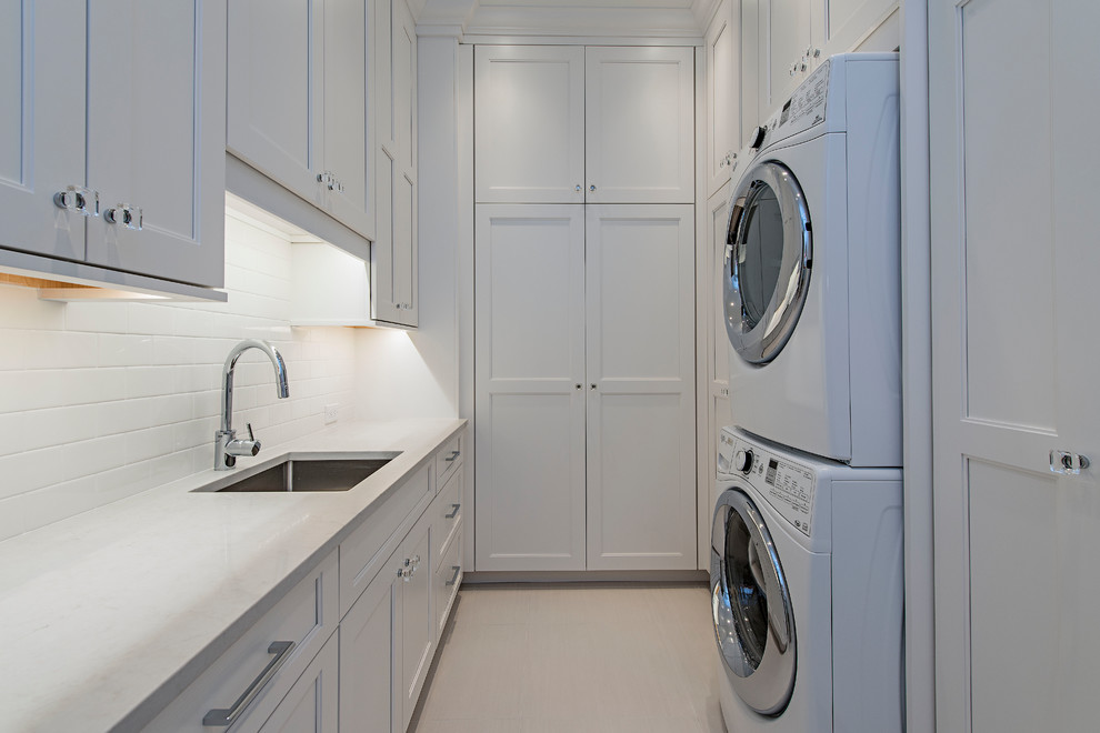 This is an example of a contemporary laundry room in Miami.