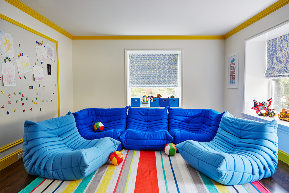 Mid-sized contemporary gender-neutral kids' playroom in San Francisco with white walls and dark hardwood floors for kids 4-10 years old.