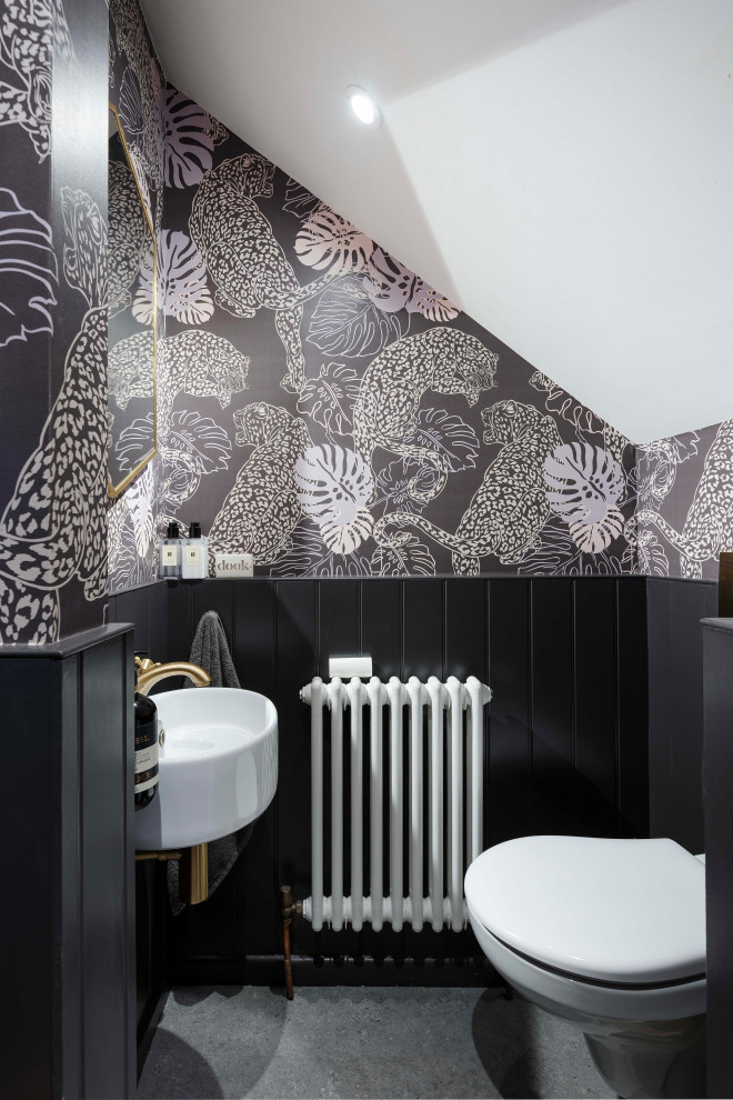 Design ideas for a victorian cloakroom with multi-coloured walls, concrete flooring, a wall-mounted sink, grey floors, wainscoting and wallpapered walls.
