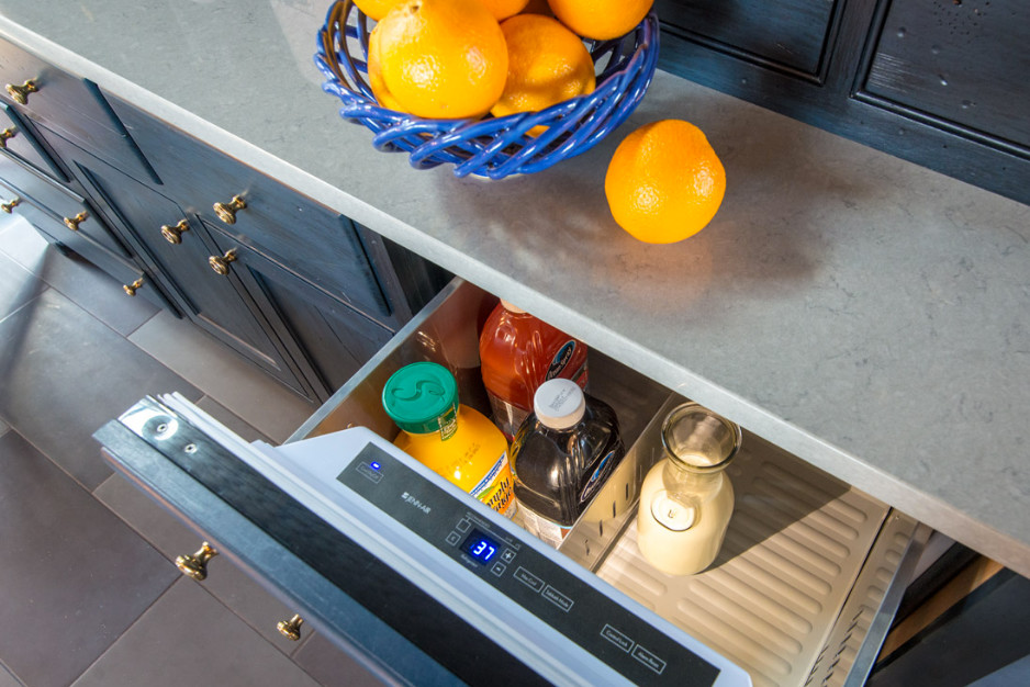 Large transitional u-shaped slate floor and gray floor eat-in kitchen photo in Boston with an undermount sink, shaker cabinets, light wood cabinets, quartz countertops, white backsplash, stone slab backsplash, paneled appliances and an island