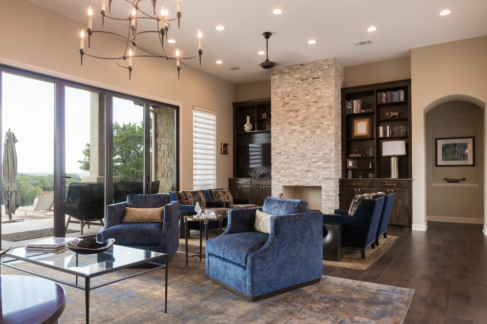 Design ideas for a mid-sized transitional formal enclosed living room in Austin with beige walls, dark hardwood floors, a standard fireplace, a stone fireplace surround, no tv and brown floor.