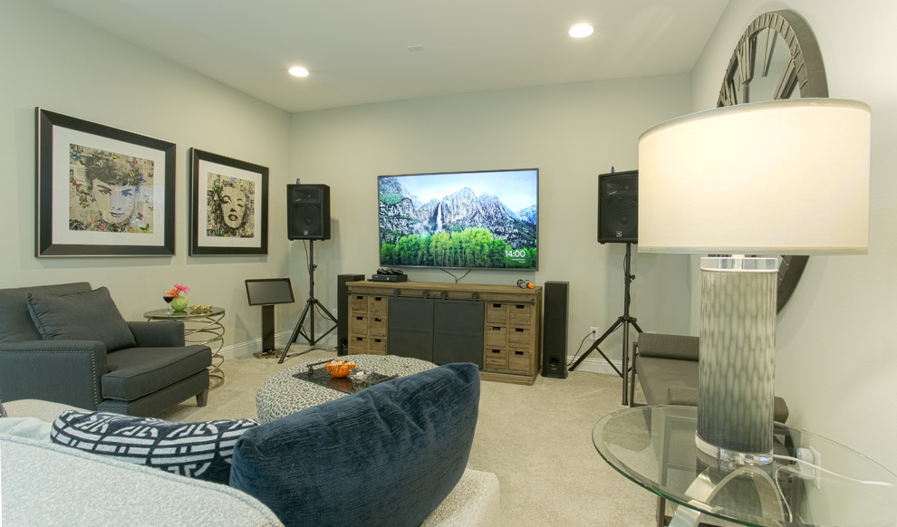 This is an example of a mid-sized transitional enclosed home theatre in Dallas with grey walls, carpet, a wall-mounted tv and grey floor.
