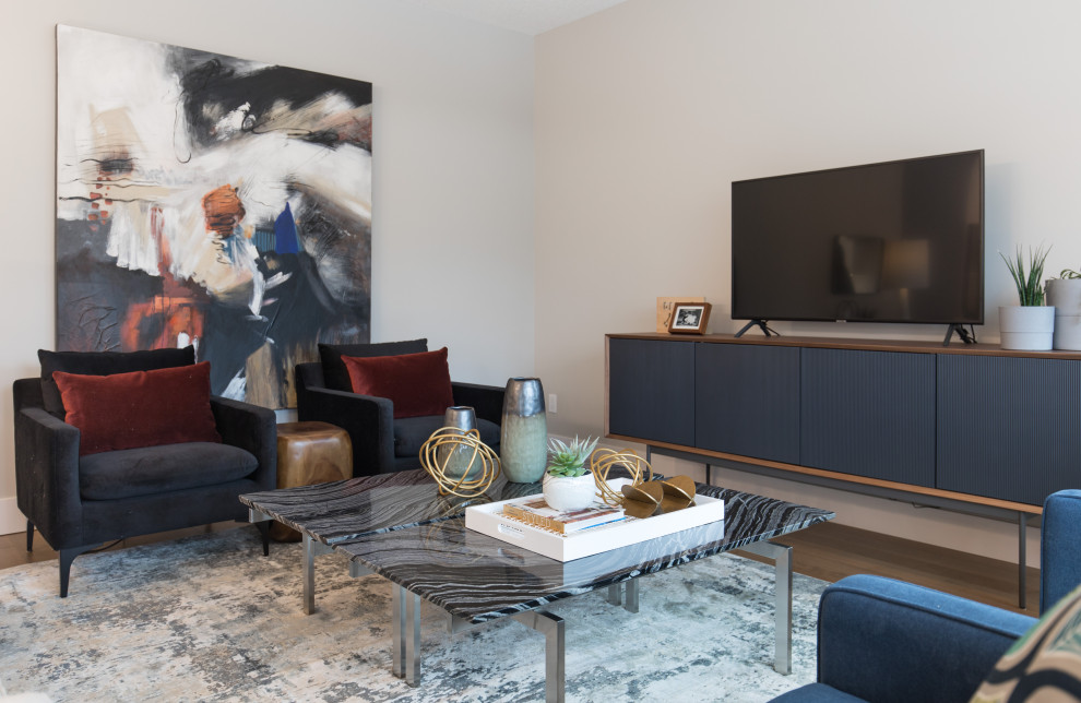 Inspiration for a mid-sized transitional open concept light wood floor and brown floor living room remodel in Calgary with no fireplace and a tv stand