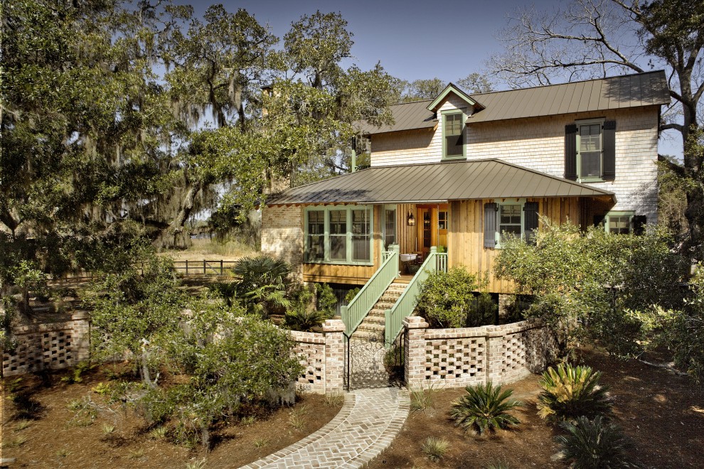 Design ideas for a country exterior in Atlanta with wood siding.