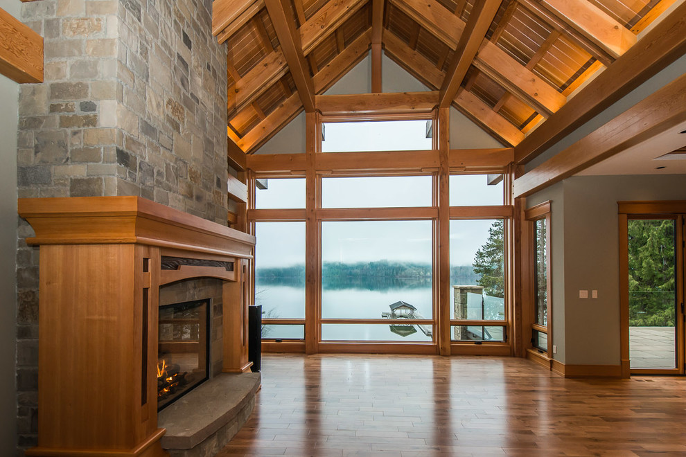 Example of a mountain style home design design in Vancouver