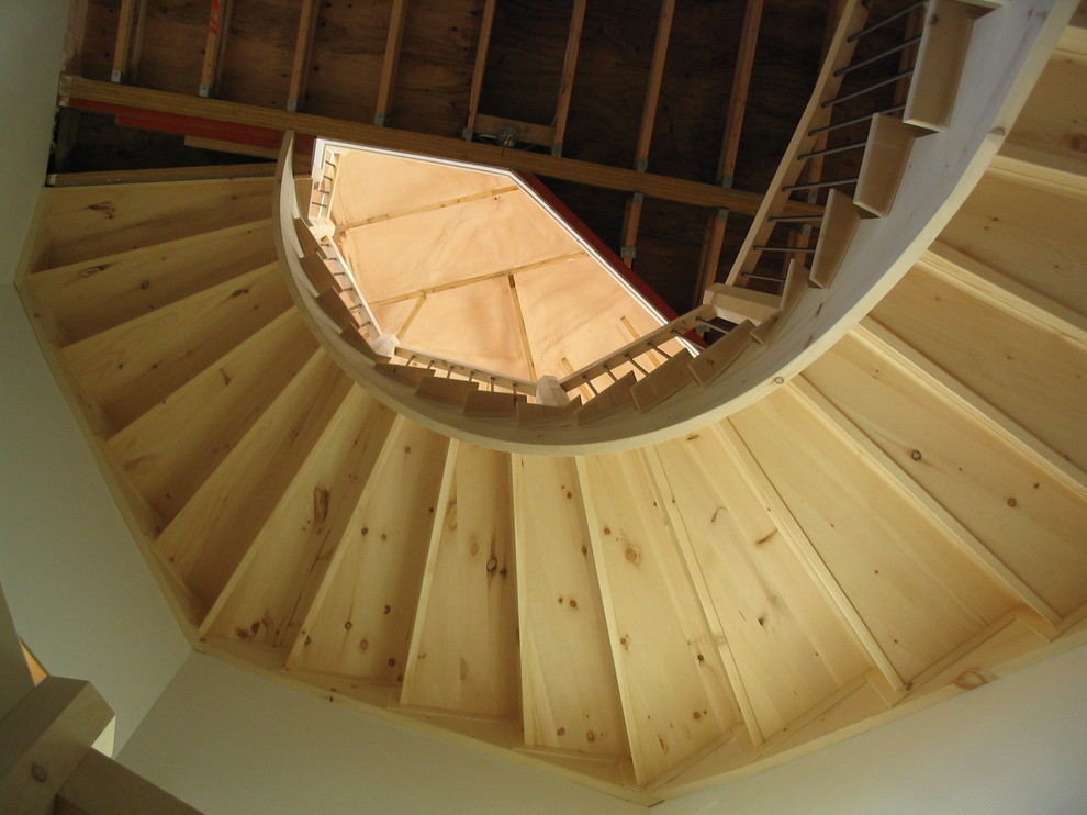 Staircase - huge rustic wooden curved staircase idea with wooden risers