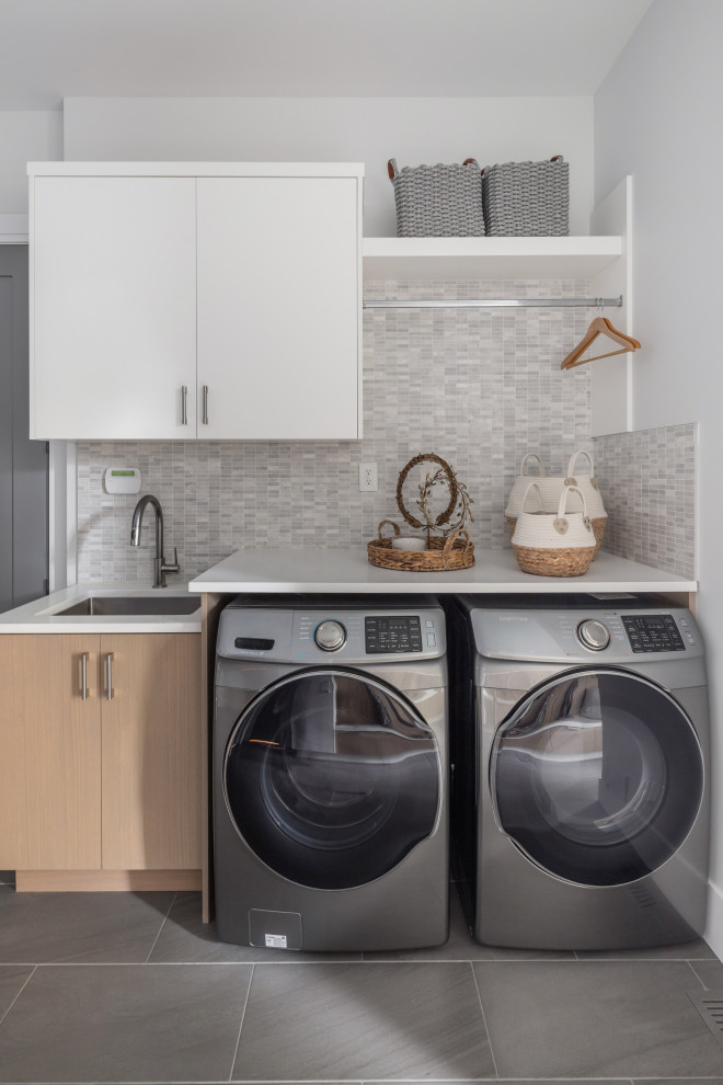 Design ideas for a contemporary laundry room in Vancouver.