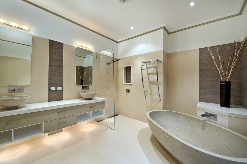 Design ideas for a contemporary master bathroom in Adelaide with a vessel sink, flat-panel cabinets, beige cabinets, a freestanding tub, a corner shower, beige tile and white walls.