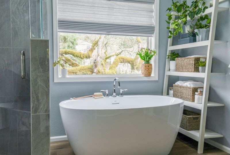 Inspiration for a transitional master multicolored tile vinyl floor, brown floor and double-sink corner shower remodel with shaker cabinets, white cabinets, blue walls, an undermount sink, quartz countertops, a hinged shower door, white countertops and a built-in vanity