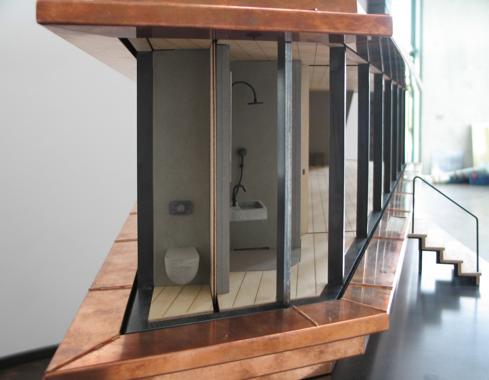 Esempio di una piccola stanza da bagno moderna con doccia a filo pavimento, top in cemento, un lavabo e mobile bagno sospeso