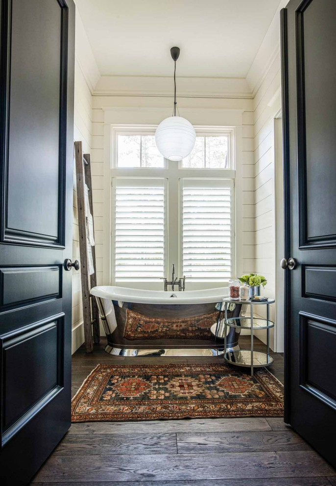 Master dark wood floor, brown floor and shiplap wall freestanding bathtub photo with white walls and a hinged shower door