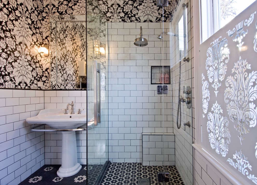 Design ideas for a small traditional master bathroom in Wellington with a corner shower, white tile, subway tile, ceramic floors, a pedestal sink, black floor and a hinged shower door.