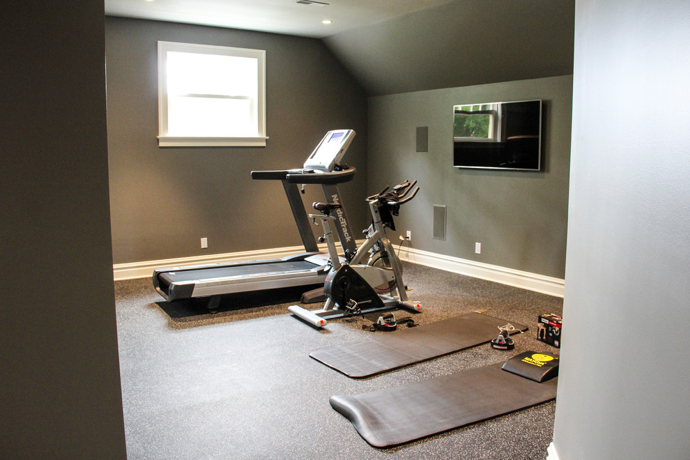 Photo of a mid-sized transitional multipurpose gym in Other with grey walls.
