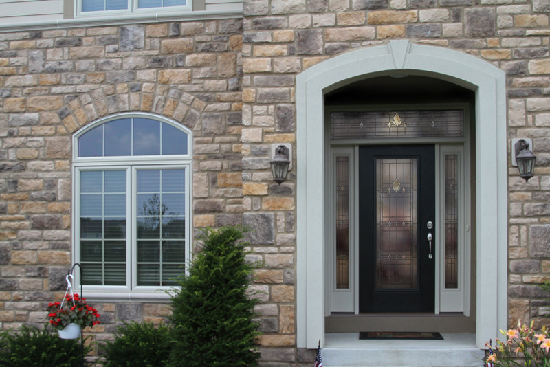 Mid-sized traditional front door in Denver with a single front door and a glass front door.