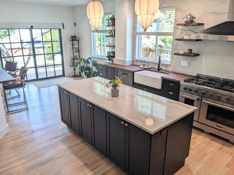 Example of a transitional kitchen design in Denver