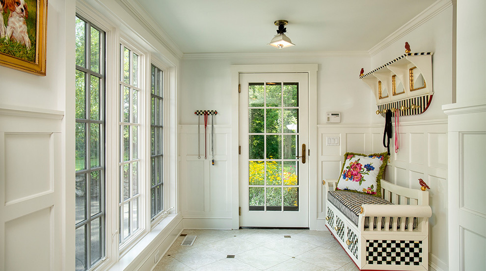 Design ideas for a mid-sized country mudroom in New York with white walls, a single front door, a white front door, grey floor and ceramic floors.