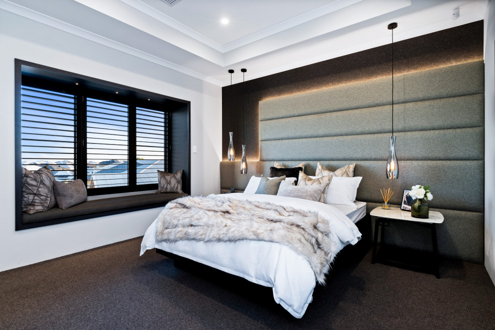 This is an example of a mid-sized contemporary master bedroom in Perth with white walls, carpet and black floor.
