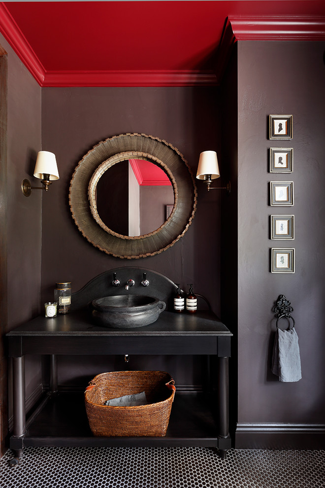 Traditional powder room in London with open cabinets, brown walls, a vessel sink and black floor.