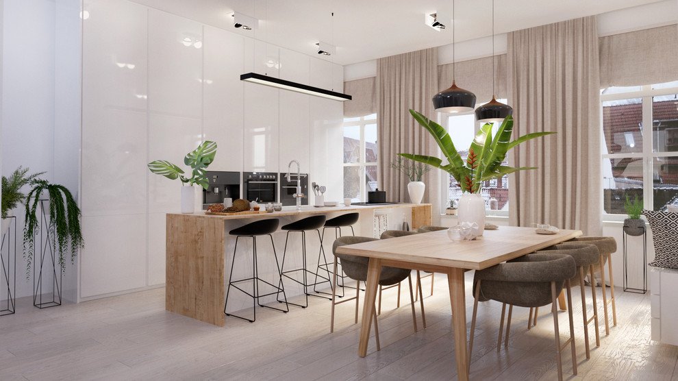 Mid-sized scandinavian single-wall eat-in kitchen in Brussels with white cabinets, beige floor and brown benchtop.