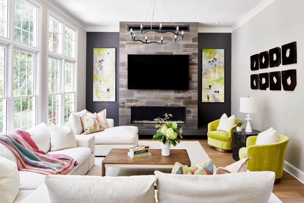 Living room - large transitional open concept laminate floor living room idea in Atlanta with gray walls, a tile fireplace and a wall-mounted tv