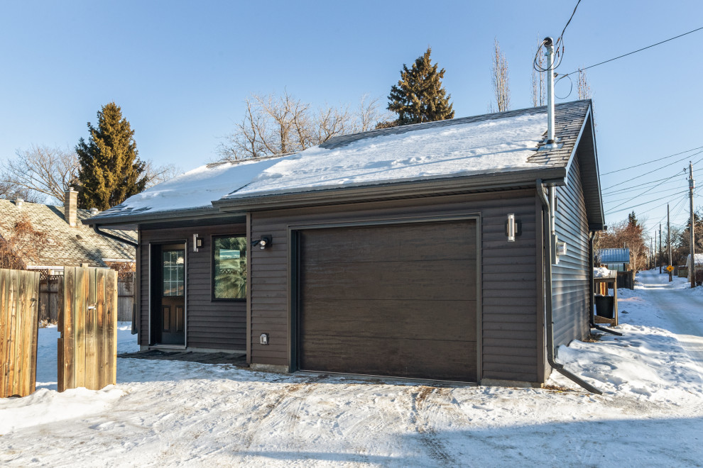 Mid-sized elegant detached one-car garage workshop photo in Edmonton