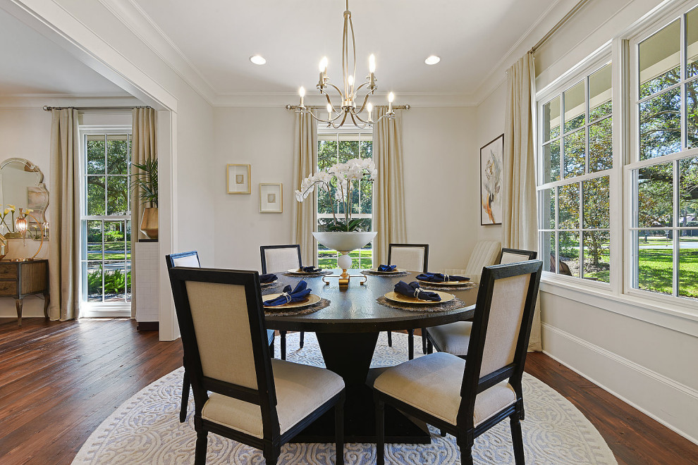 Dining room - mid-sized transitional dark wood floor and brown floor dining room idea with white walls