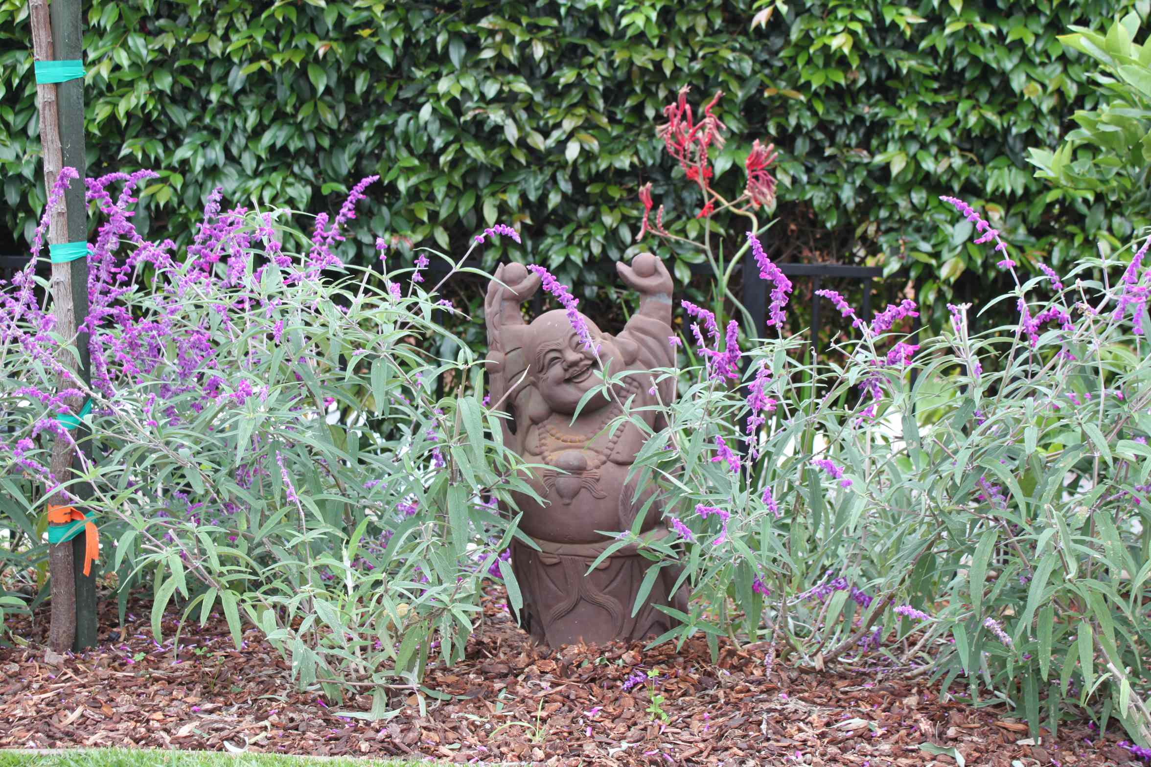 Garden Art Tucked Into the Plantings