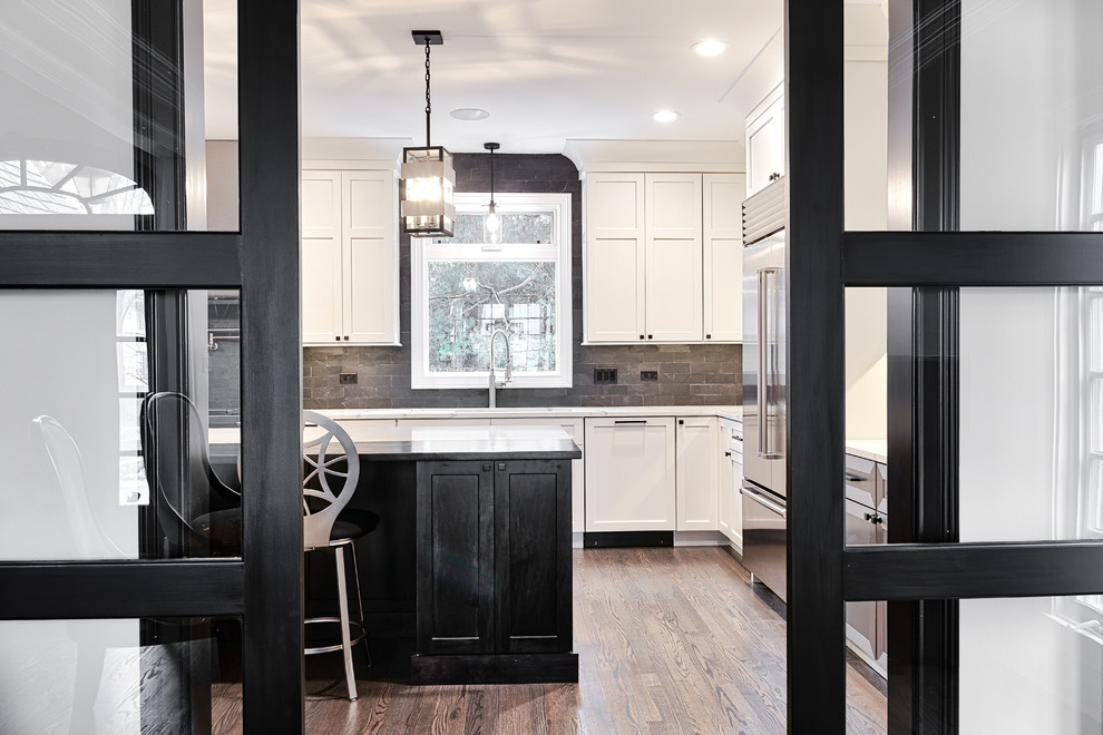 Eat-in kitchen - large transitional u-shaped medium tone wood floor and brown floor eat-in kitchen idea in Nashville with an undermount sink, shaker cabinets, dark wood cabinets, solid surface countertops, black backsplash, brick backsplash, stainless steel appliances, an island and white countertops