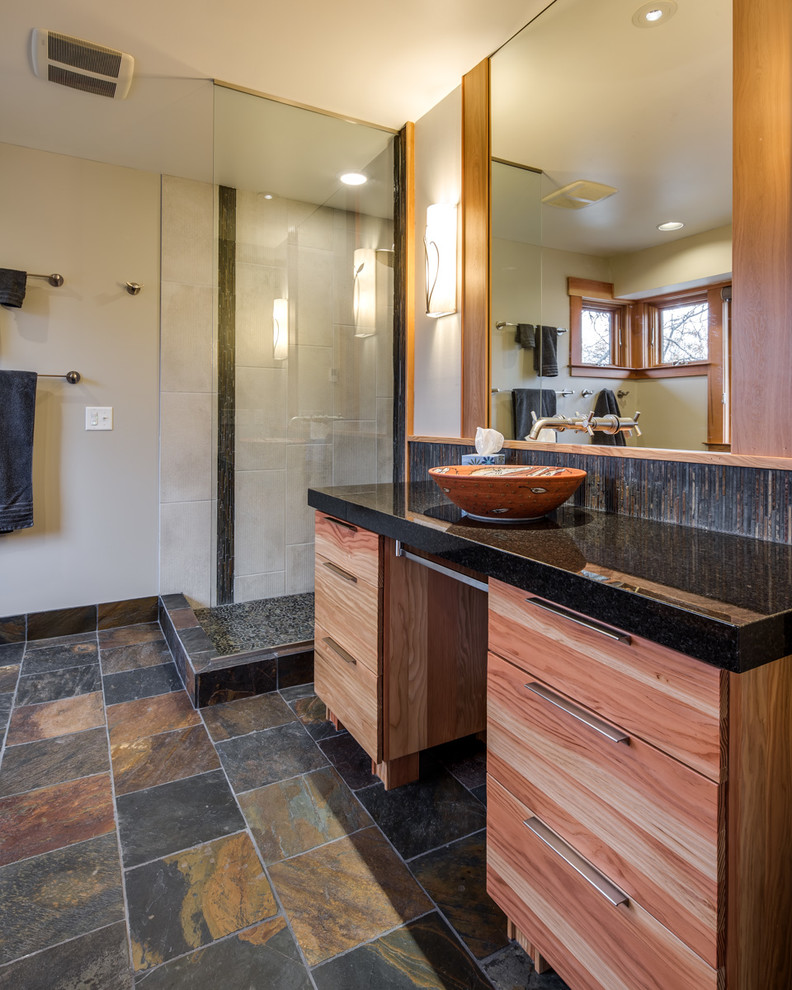 Large modern master bathroom in Minneapolis with a vessel sink, flat-panel cabinets, medium wood cabinets, a corner shower and beige walls.