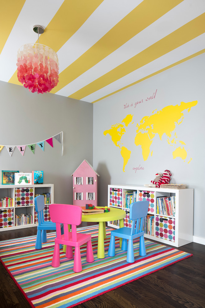 Design ideas for a mid-sized contemporary kids' playroom for kids 4-10 years old and girls in Dallas with dark hardwood floors and grey walls.