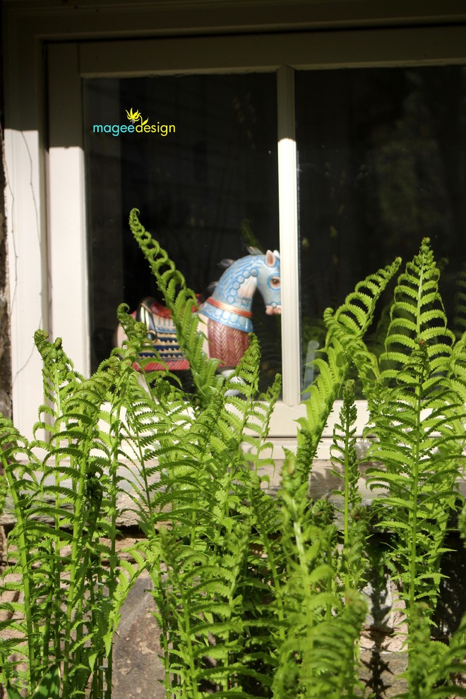 Inspiration for a large rustic drought-tolerant and partial sun backyard stone landscaping in DC Metro for spring.