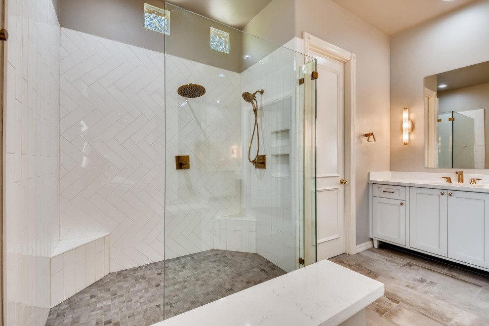 White subway tile with gold fixtures