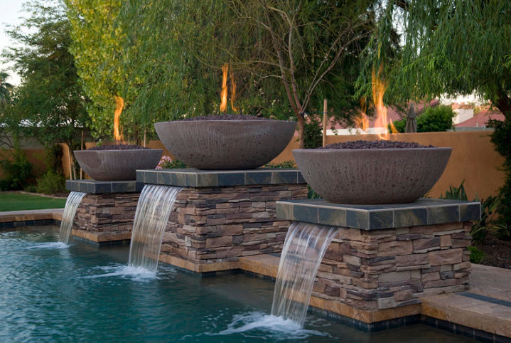 Design ideas for a contemporary pool in Phoenix.