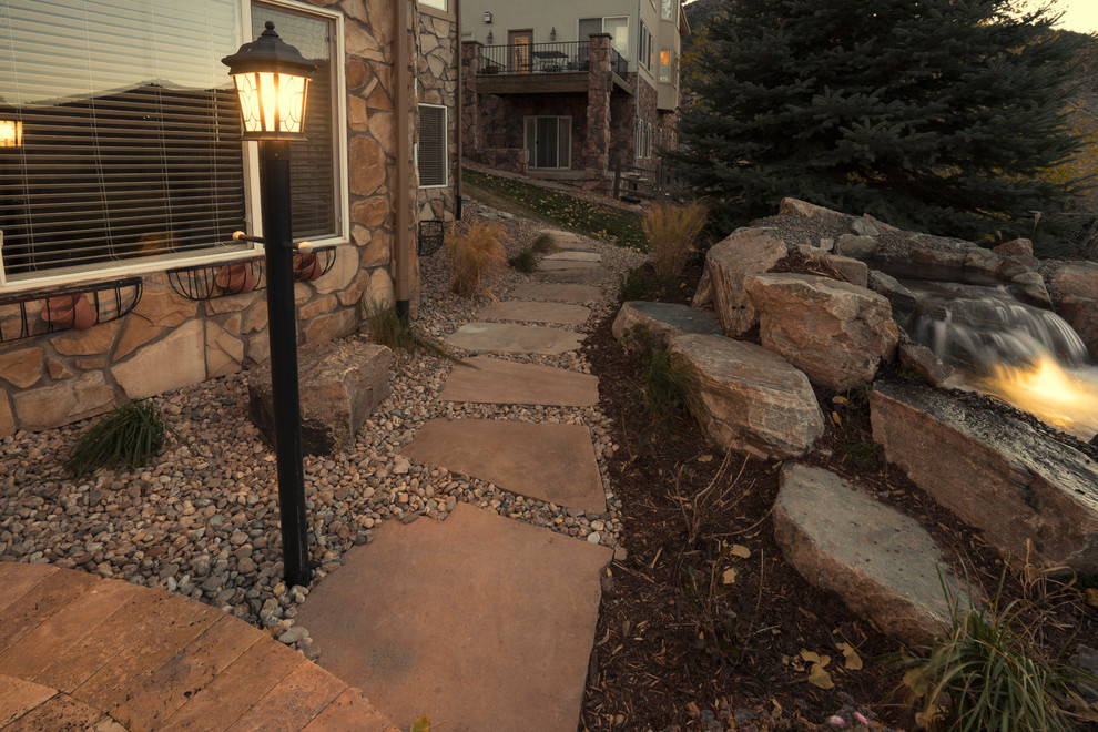 Inspiration for a rustic landscaping in Denver.