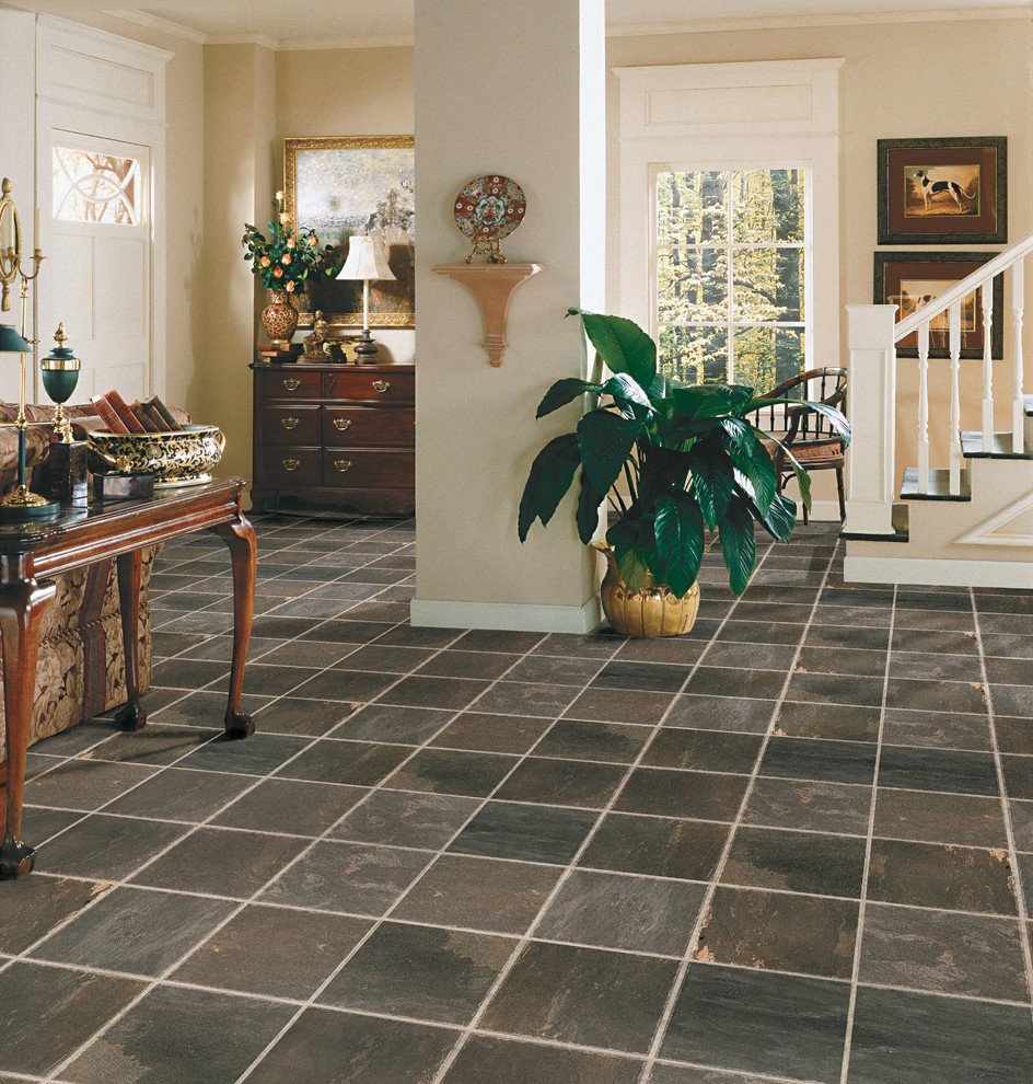 Inspiration for a transitional foyer remodel in Miami with beige walls and a white front door