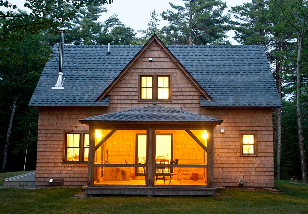 Country exterior in Boston with wood siding.