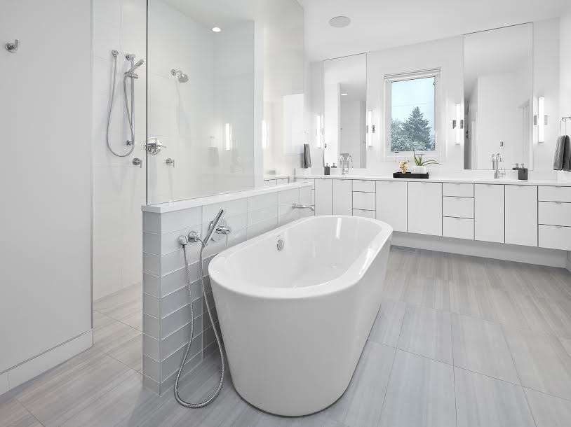 Inspiration for an expansive modern master bathroom in Calgary with flat-panel cabinets, white cabinets, a freestanding tub, an open shower, white tile, subway tile, engineered quartz benchtops, an open shower, white walls, laminate floors, an undermount sink and grey floor.
