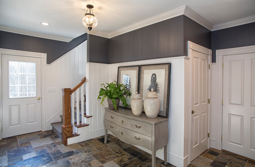 Design ideas for a mid-sized transitional front door in Boston with black walls, porcelain floors, a single front door, a white front door and multi-coloured floor.
