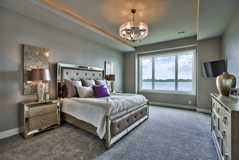 Inspiration for a contemporary master bedroom in Omaha with carpet and grey walls.