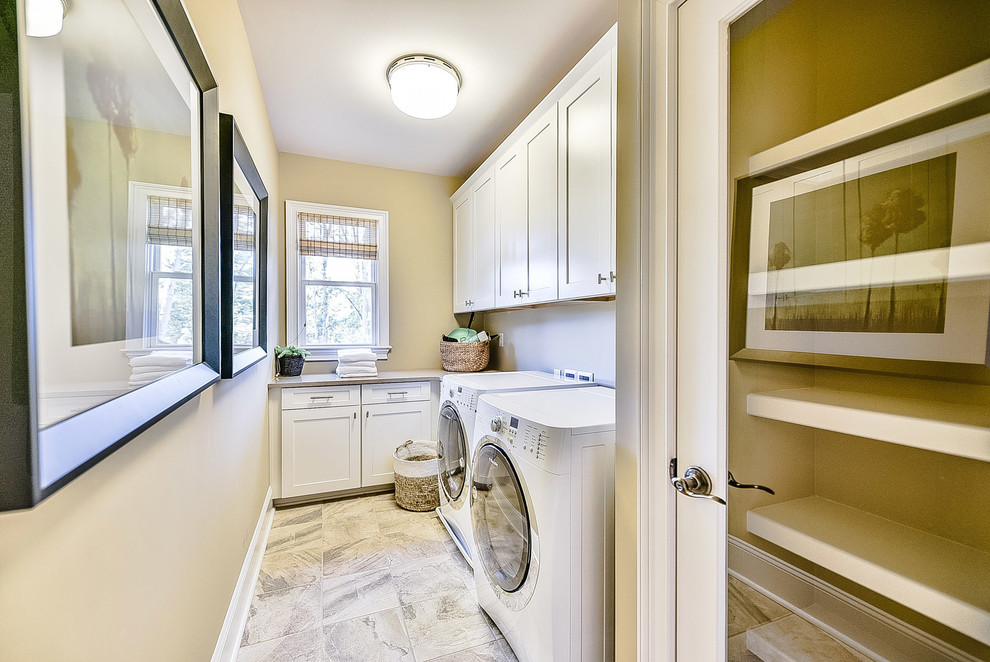 Photo of a transitional laundry room in Charlotte.