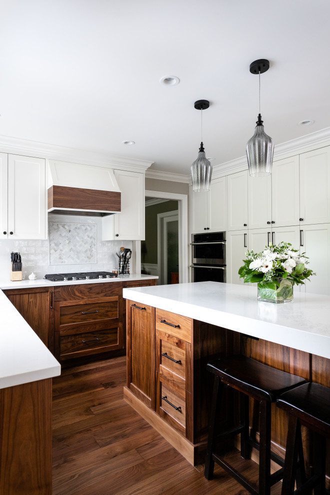 Example of a transitional kitchen design in Vancouver