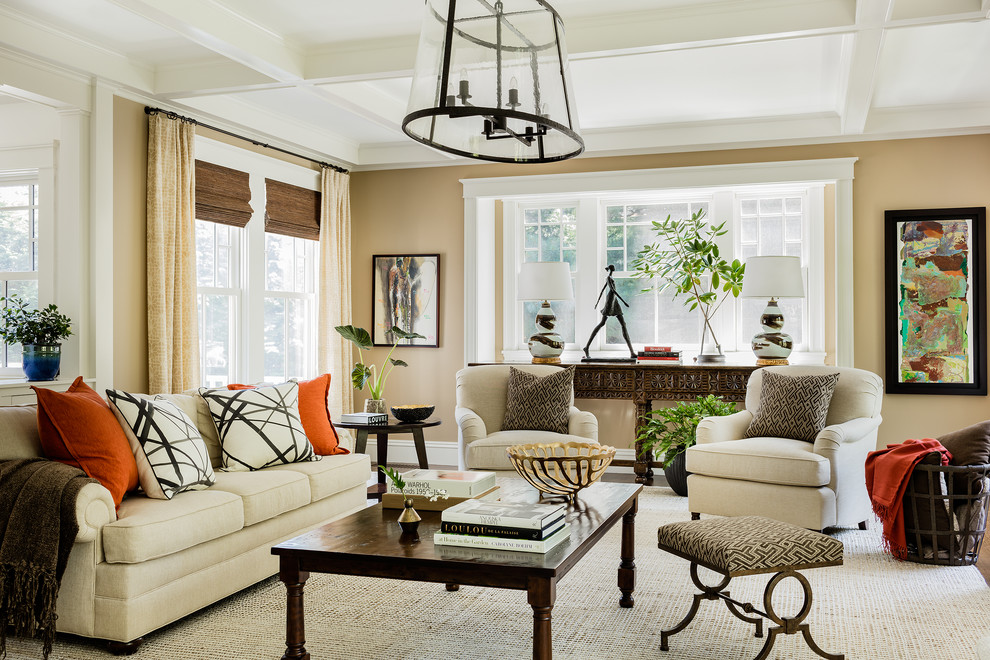Design ideas for a traditional living room in Boston with beige walls and beige floor.