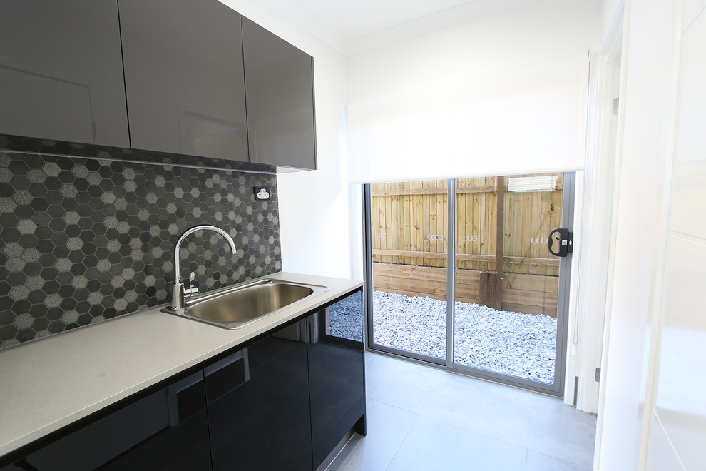 Contemporary laundry room in Brisbane.