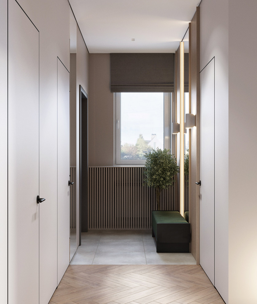 На фото: коридор среднего размера: освещение в современном стиле с бежевыми стенами, полом из керамогранита, бежевым полом и обоями на стенах с