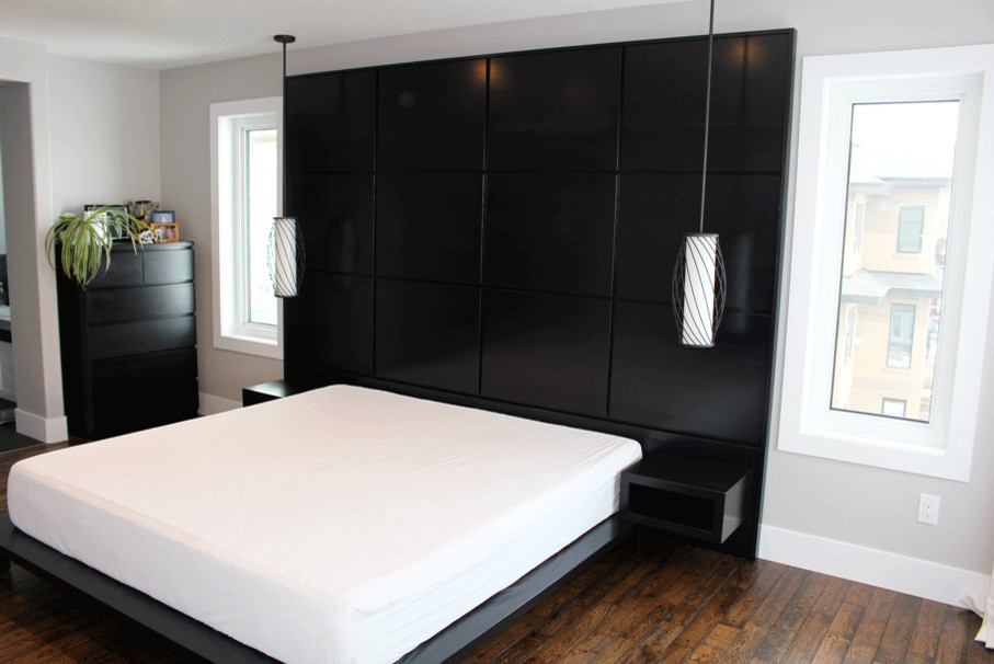 This is an example of a contemporary bedroom in Edmonton.