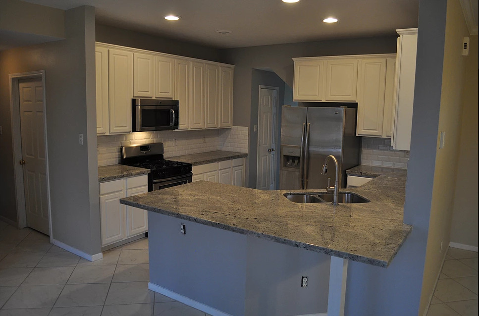 Example of a transitional kitchen design in Houston
