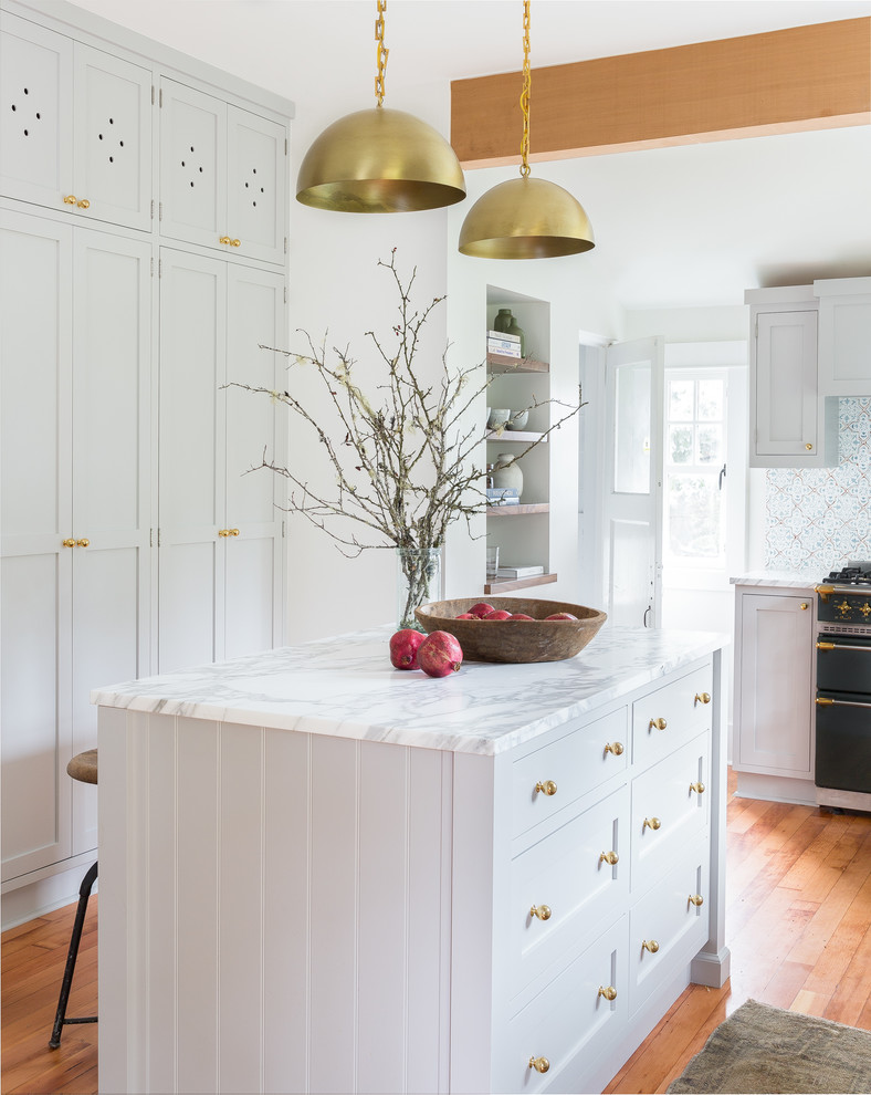 Example of a transitional kitchen design in Seattle