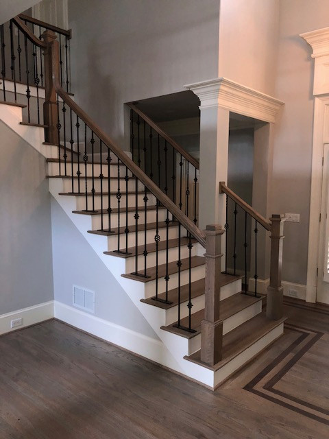 Mid-sized transitional wood l-shaped staircase in Atlanta with painted wood risers and mixed railing.